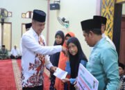 Safari Ramadhan di Masjid Al-Ubudiyah Desa Tanjung Belit, Bupati Kampar Salurkan Bantuan untuk Masyarakat.